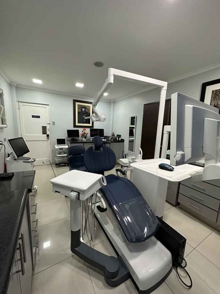 Dental treatment room at OG Center with a dental chair and equipment