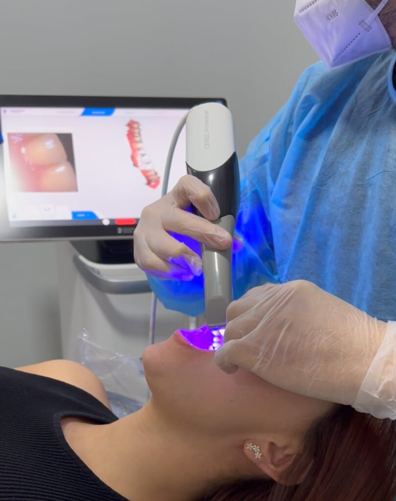 A clinician takes a digital intraoral scan of a patient at OG Center